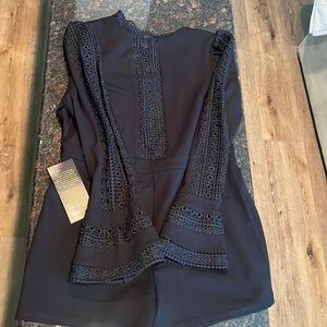 Bebe Ruffle Bell Sleeve Romper size XL